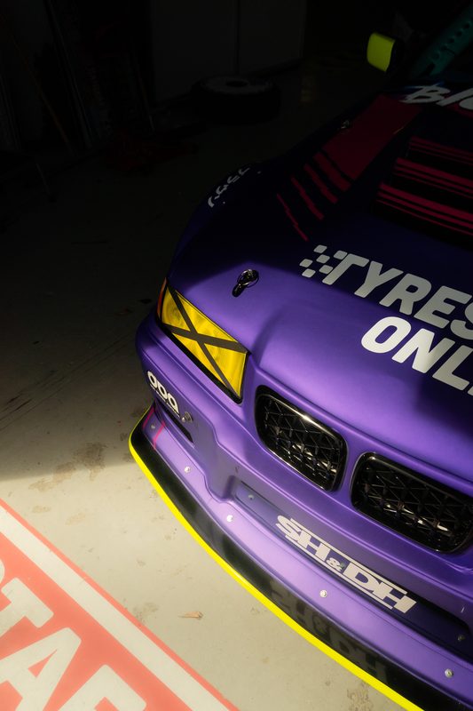Purple drift car on track