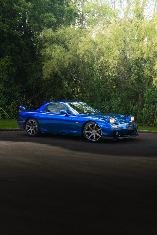 Blue RX7 profile shot